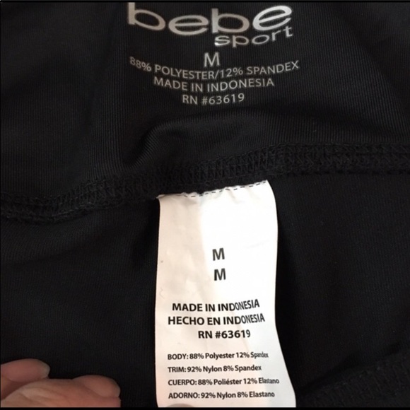 Bebe Capris With Cut Out Deign on leg bottom - Picture 3 of 6